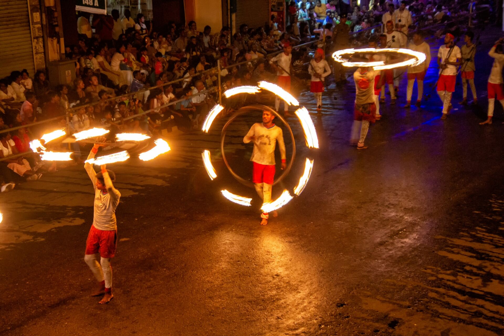 Traditional Kandyan fire dancers performing in Kandy