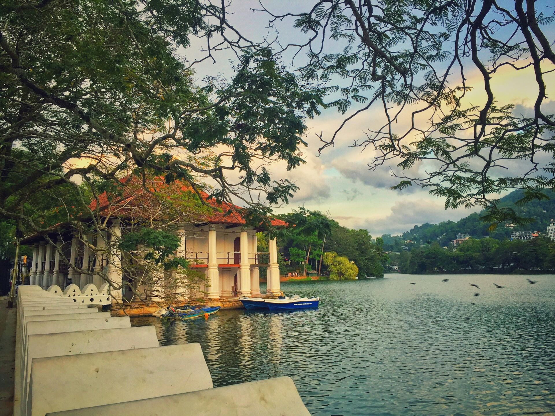 Temple of the Tooth beside Kandy Lake