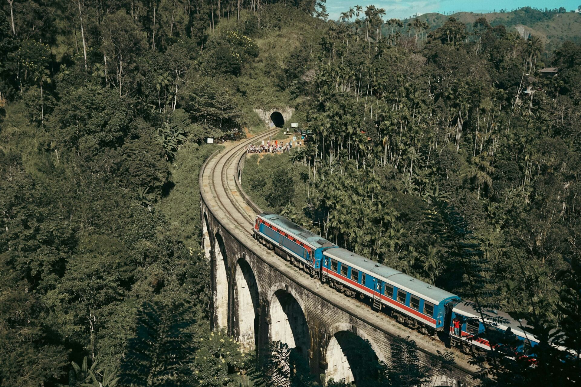 Train travelling across the historic Nine Arch Bridge
